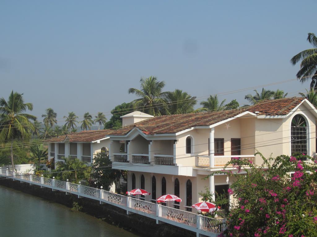 Hotel Riverside Baga Exteriör bild